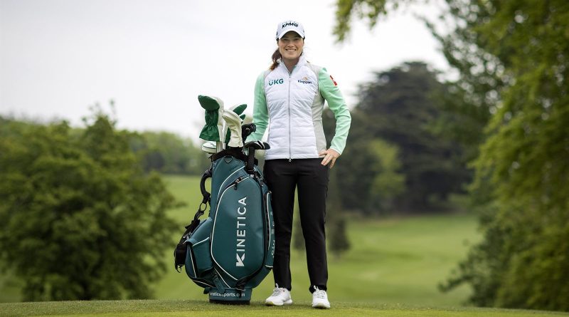 Leona Maguire standing on a golf course beside her golf bag