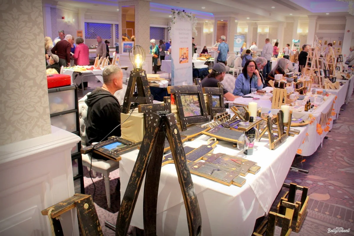 Independent makers and visitors at a previous Autumn Craft and Gift Fair.
